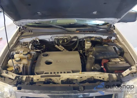 2009 Ford Escape Hybrid из США, поврежденный, VIN 1FMCU59319KB25744